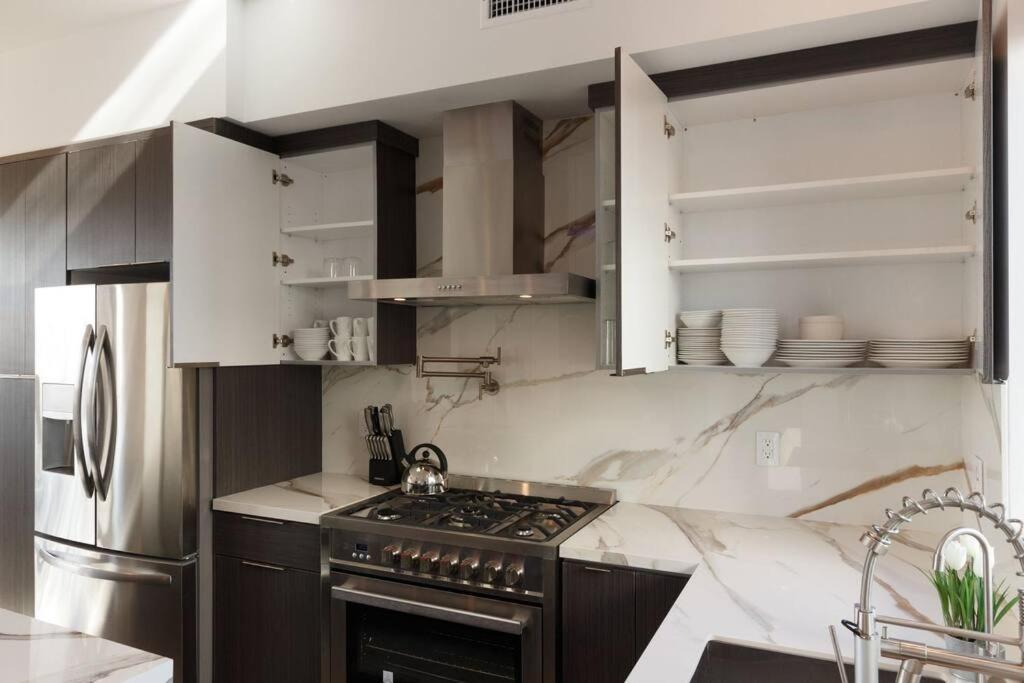 Modern 4 Bedroom Masterpiece With Rooftop Deck *